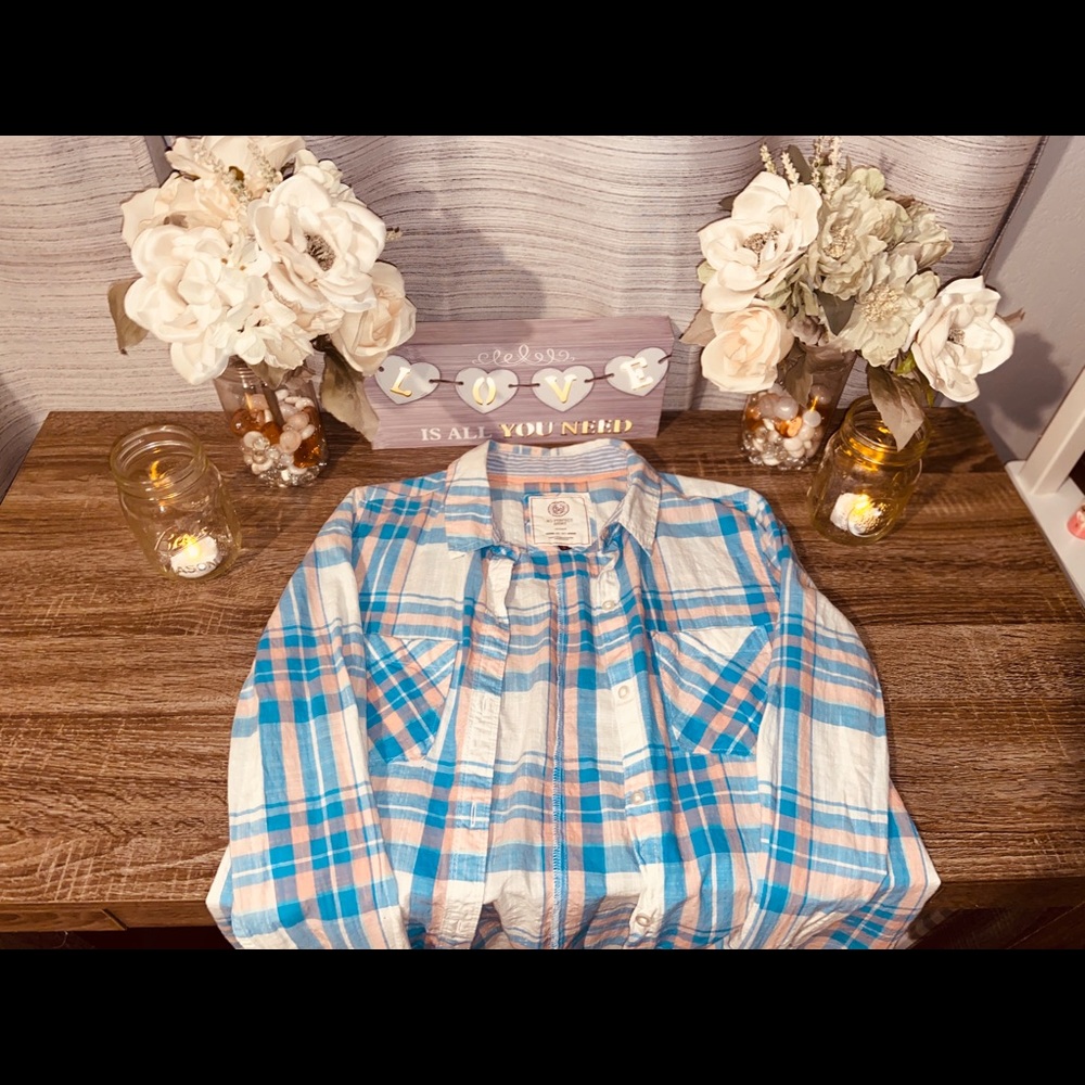 White, blue, and pink flannel.